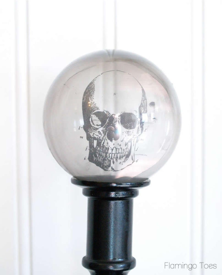 DIY Spooky Crystal Ball Halloween Candlesticks tutorial featured by top US craft blog, Flamingo Toes: Crystal Ball Skull