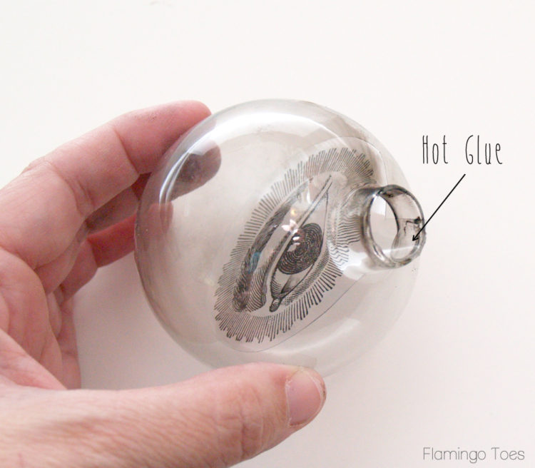 DIY Spooky Crystal Ball Halloween Candlesticks tutorial featured by top US craft blog, Flamingo Toes: Gluing transperency in bulb