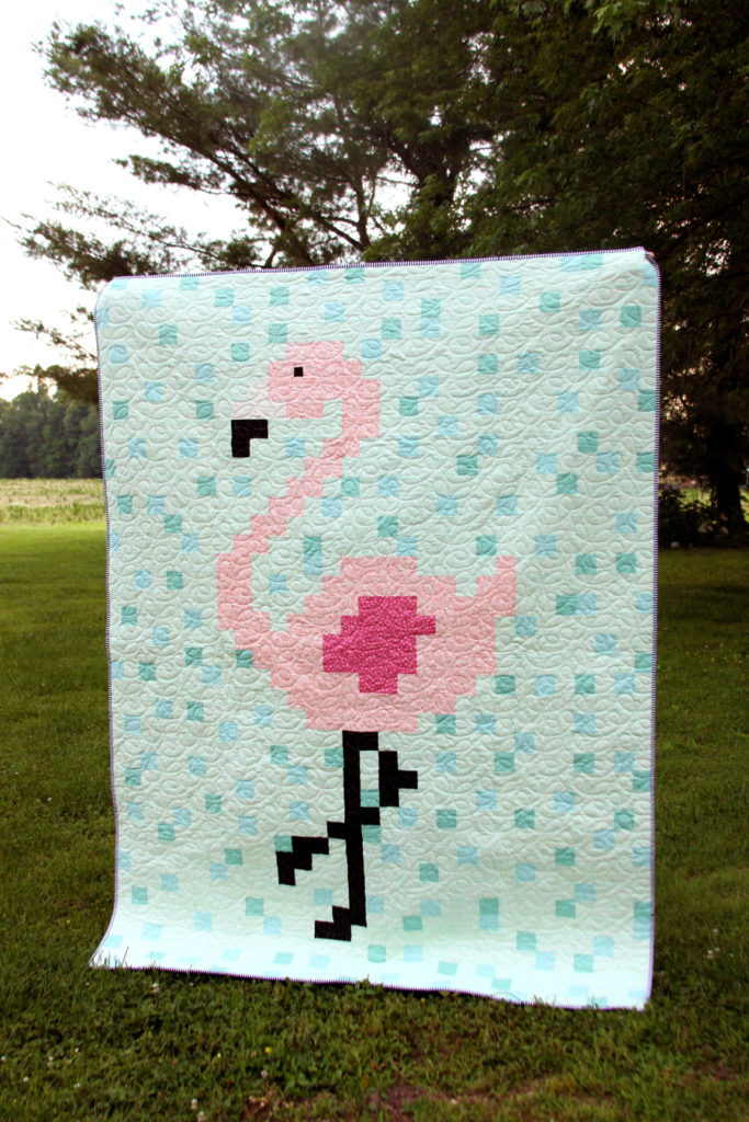 Christmas Flamingo Quilt Pattern & Layout featured by top US quilting blog, Flamingo Toes.