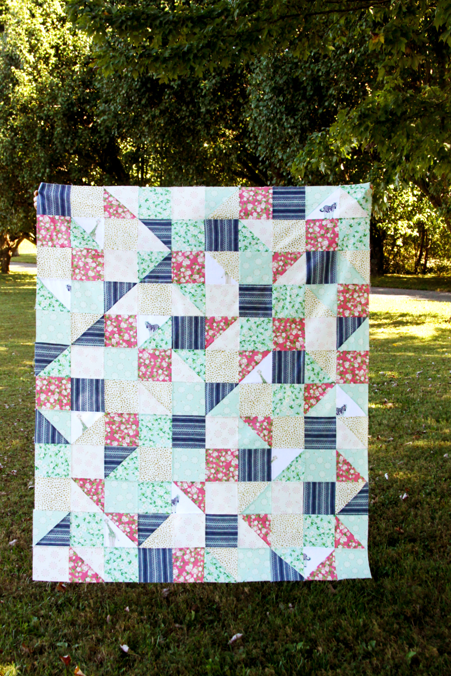 "Hidden Safari Party" is a Free Lap Quilt Pattern designed by Bev McCullough from Flamingo Toes!