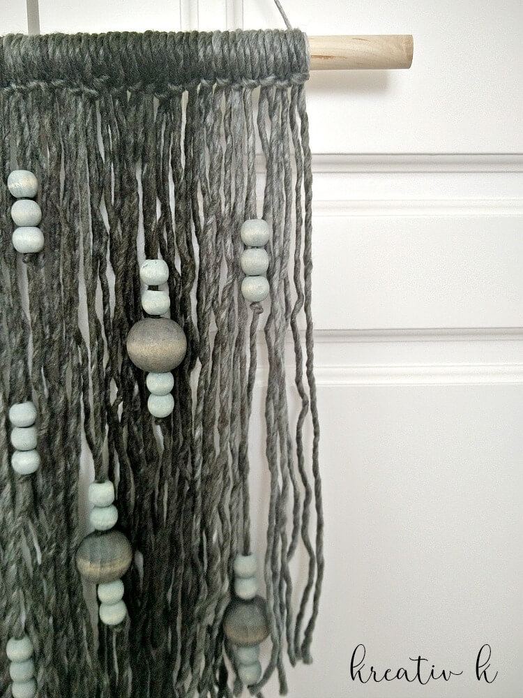 DIY Macrame with Yarn Wall Art featured by top US craft blog, Flamingo Toes.
