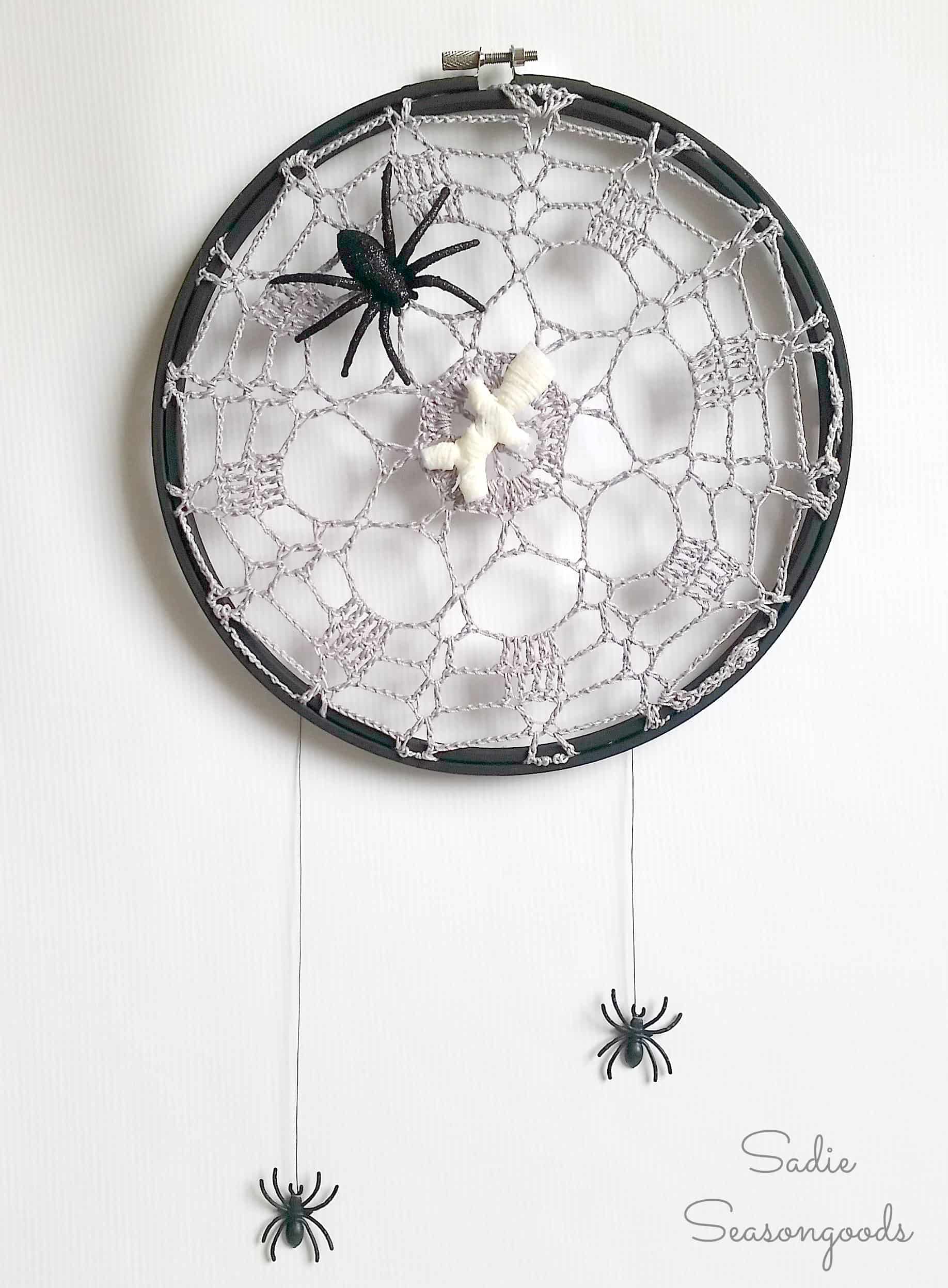 5 repurposed vintage crocheted doilies in embroidery hoops as spider web for Halloween decor Sadie Seasongoods
