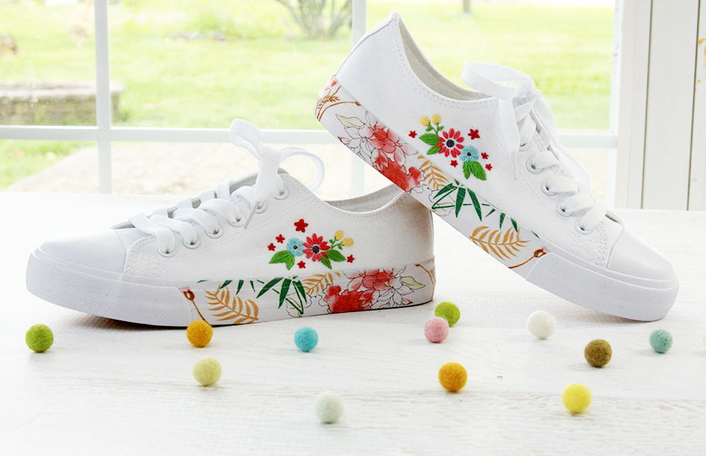 White shoes store with flower embroidery