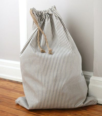 Learn to sew a simple drawstring laundry bag.