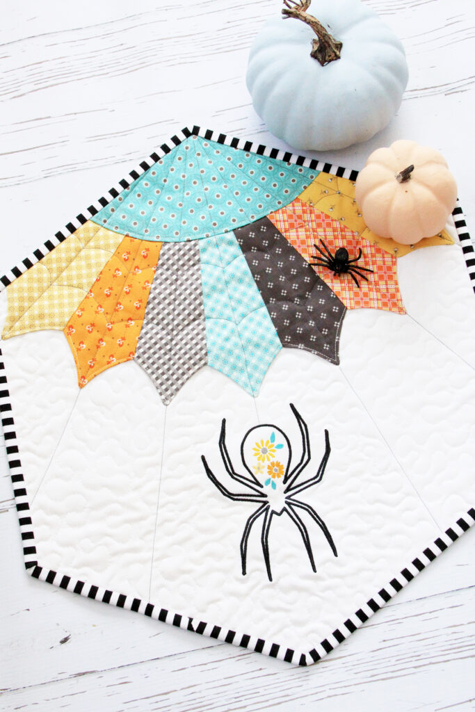 Floral Spider Web Quilt Pattern featured by top US quilting blog, Flamingo Toes. | 2019 Top Ten Quilting and Sewing Projects! by popular Tennessee quilting blog, Flamingo Toes: image of a floral spiderweb quilt pattern. 