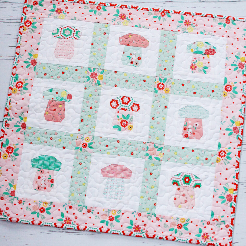 Mini Mushroom Quilt featured by top US quilting and sewing blog, Flamingo Toes.