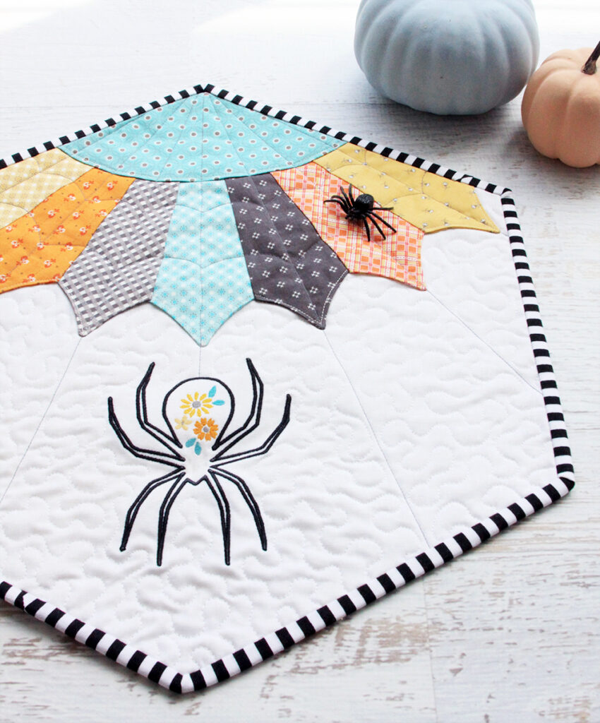 Floral Spider Web Quilt Pattern featured by top US quilting blog, Flamingo Toes.
