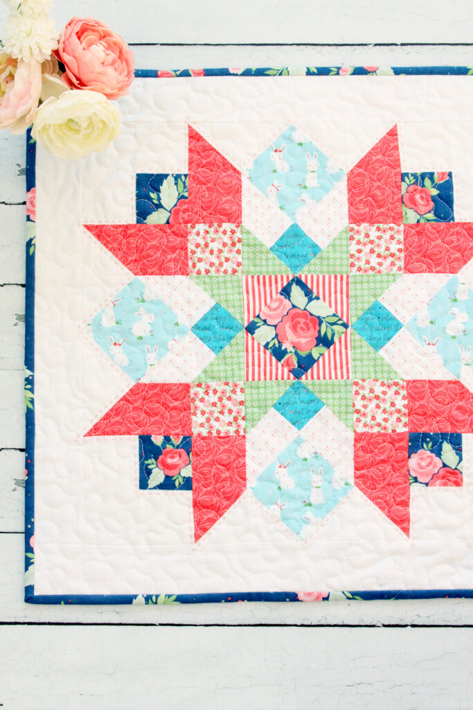 Winifred Rose Mini Quilt by popular US quilting blog, Flamingo Toes: image of a Winifred Rose Mini Quilt. 