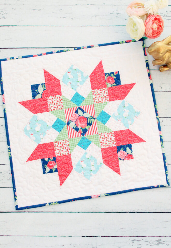 Winifred Rose Mini Quilt by popular US quilting blog, Flamingo Toes: image of a Winifred Rose Mini Quilt. 
