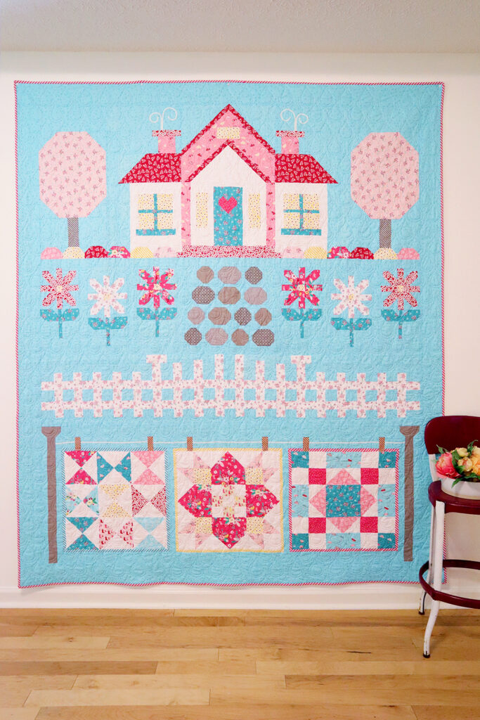 https://flamingotoes.com/wp-content/uploads/2020/10/Singing-in-the-Rain-Quilters-Cottage-Quilt-683x1024.jpg