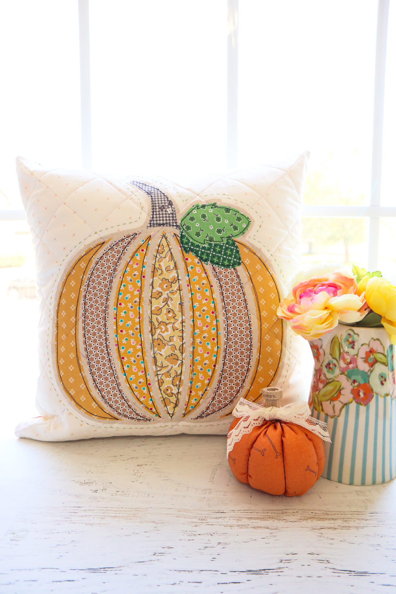 10. Autumn's Glow: Pumpkin Hooked Pillow